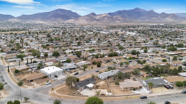 8936 Mount Rushmore Ln, El Paso, TX 79904 - aerial view of property and surrounding area featuring a mountainous background and nearby suburban area