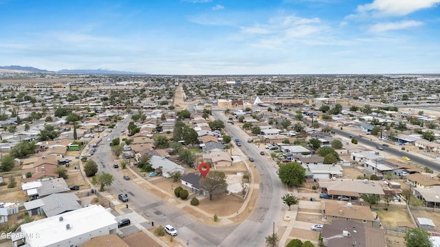 8936 Mount Rushmore Ln, El Paso, TX 79904 - aerial view of property's location featuring nearby suburban area and mountains