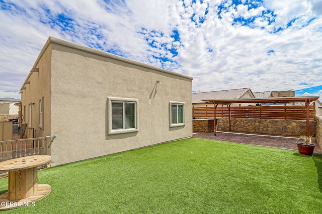 13675 Everingham St, El Paso, TX 79928 - back of house with stucco siding
