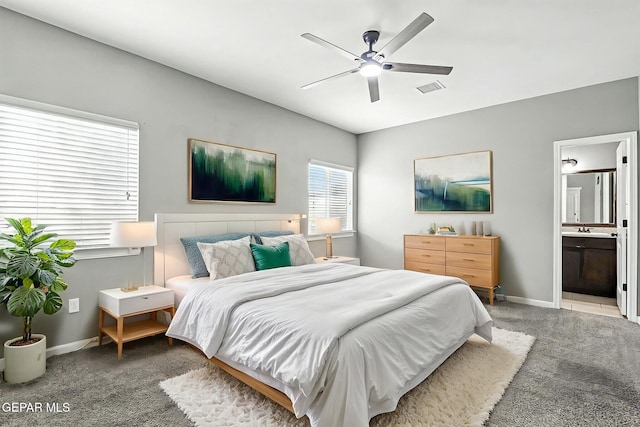 13675 Everingham St, El Paso, TX 79928 - carpeted bedroom with ensuite bath and a ceiling fan
