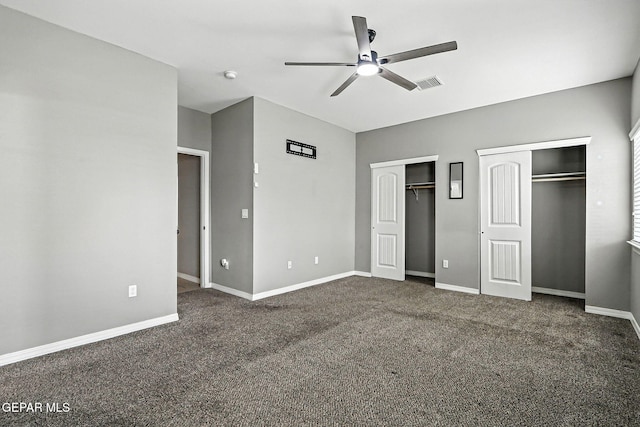 13675 Everingham St, El Paso, TX 79928 - unfurnished bedroom featuring two closets, carpet, and a ceiling fan