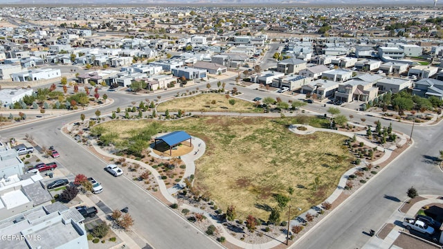 13675 Everingham St, El Paso, TX 79928 - aerial view of property and surrounding area with mountains and nearby suburban area