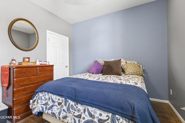 658 Sara Lynn Ct, El Paso, TX 79932 - bedroom featuring wood finished floors and baseboards