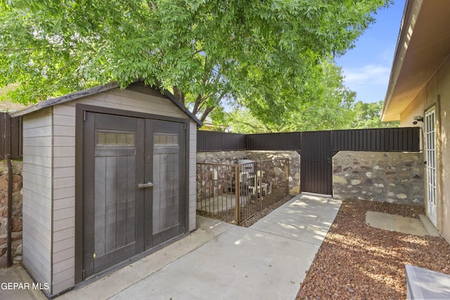 658 Sara Lynn Ct, El Paso, TX 79932 - view of shed featuring a fenced backyard and a gate