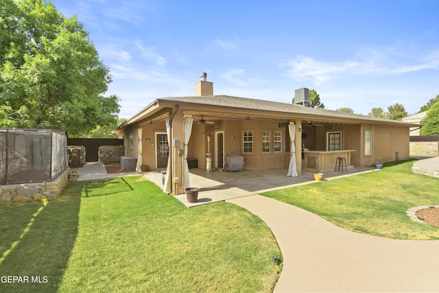 658 Sara Lynn Ct, El Paso, TX 79932 - rear view of property with a ceiling fan, a chimney, stucco siding, and a patio
