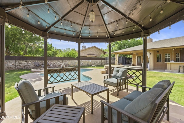 658 Sara Lynn Ct, El Paso, TX 79932 - fenced backyard with an outdoor hangout area, a patio, and a gazebo