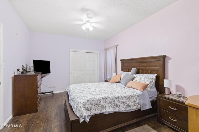658 Sara Lynn Ct, El Paso, TX 79932 - bedroom featuring dark wood-type flooring, a closet, ceiling fan, and a textured ceiling