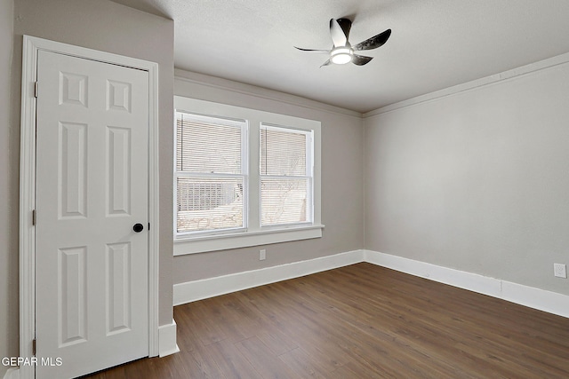 3413 Monroe Ave, El Paso, TX 79930 - unfurnished room with a ceiling fan and dark wood finished floors