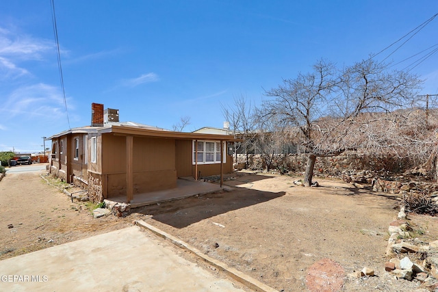3413 Monroe Ave, El Paso, TX 79930 - view of property exterior featuring a chimney