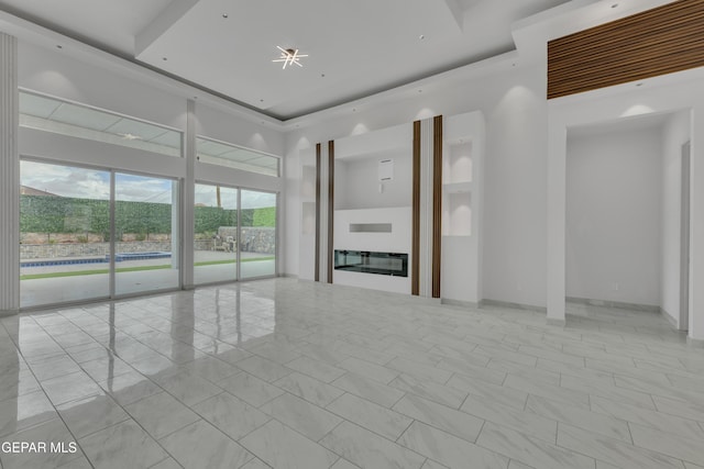 11345 Patricia Ave, El Paso, TX 79936 - empty room featuring a towering ceiling and marble finish flooring