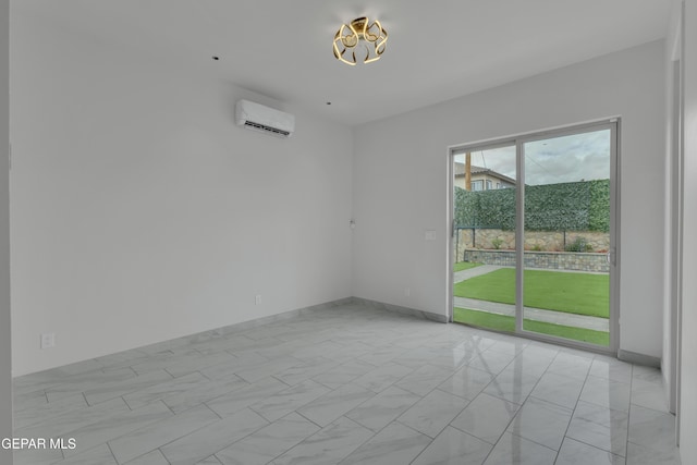 11345 Patricia Ave, El Paso, TX 79936 - spare room with an AC wall unit and a chandelier