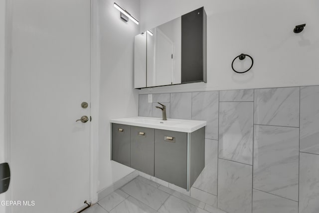 11345 Patricia Ave, El Paso, TX 79936 - bathroom featuring vanity and marble look tile flooring