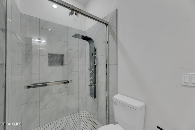 11345 Patricia Ave, El Paso, TX 79936 - bathroom with toilet and a shower stall