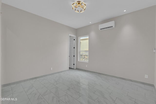 11345 Patricia Ave, El Paso, TX 79936 - unfurnished room featuring a wall mounted air conditioner, a chandelier, light marble finish flooring, and recessed lighting