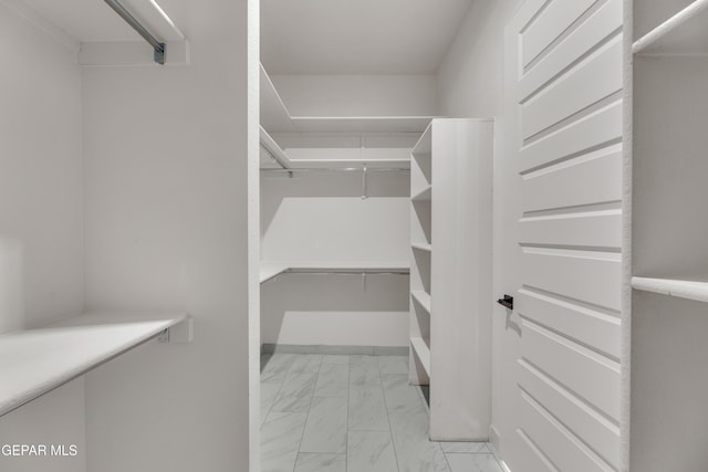 11345 Patricia Ave, El Paso, TX 79936 - spacious closet featuring light marble finish flooring