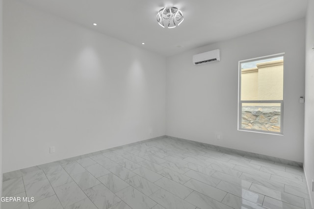 11345 Patricia Ave, El Paso, TX 79936 - unfurnished room featuring a wall unit AC, marble look tiles, and recessed lighting