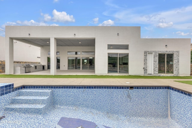 11345 Patricia Ave, El Paso, TX 79936 - view of swimming pool featuring exterior kitchen, an empty pool, and a patio