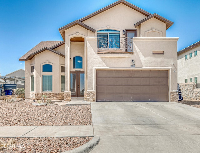 12616 Blazing Star Dr, El Paso, TX 79928 - view of front of house with a balcony, french doors, stone siding, and stucco siding