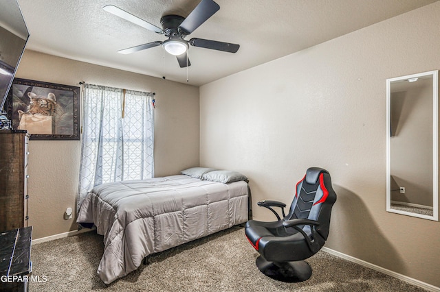 12616 Blazing Star Dr, El Paso, TX 79928 - bedroom with carpet, a ceiling fan, and a textured wall