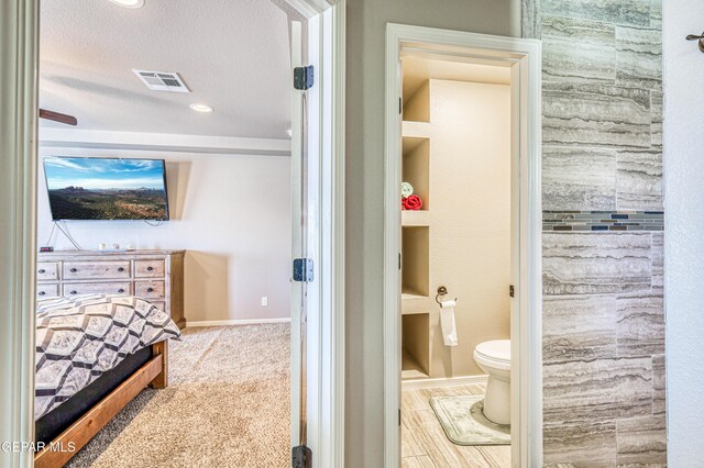 12616 Blazing Star Dr, El Paso, TX 79928 - bathroom with toilet and baseboards