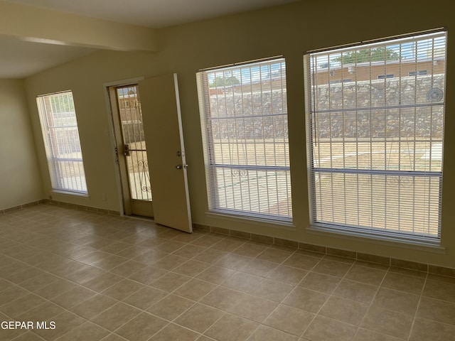 5109 Yvette Ave, El Paso, TX 79924 - doorway to outside featuring tile patterned flooring and baseboards