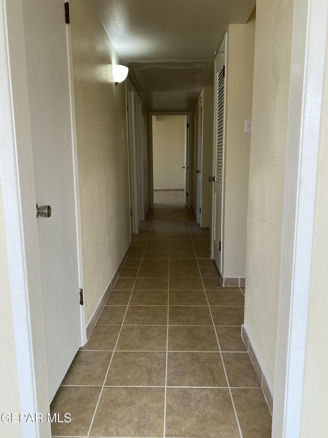 5109 Yvette Ave, El Paso, TX 79924 - corridor with tile patterned flooring