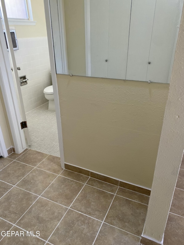 5109 Yvette Ave, El Paso, TX 79924 - bathroom featuring tile patterned flooring and tile walls