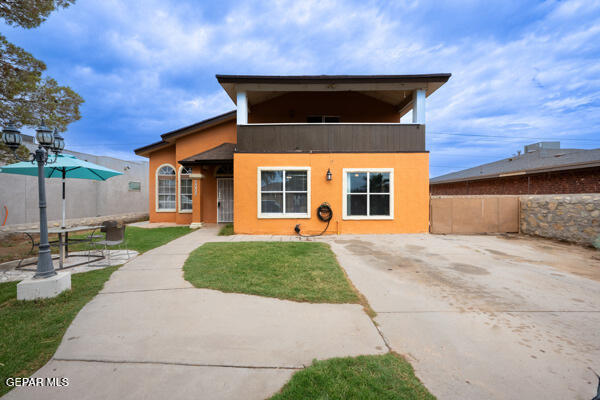 9813 La Morenita Cir, El Paso, TX 79927 - view of front facade with a patio area, stucco siding, and a balcony