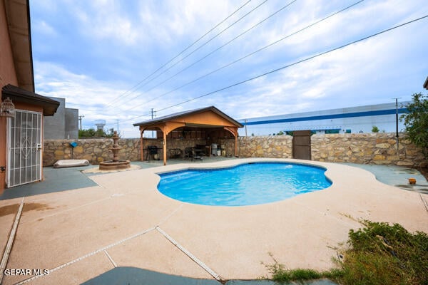 9813 La Morenita Cir, El Paso, TX 79927 - view of pool featuring a gazebo, a patio area, and a water view