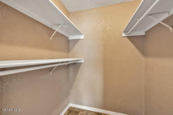 9813 La Morenita Cir, El Paso, TX 79927 - view of walk in closet