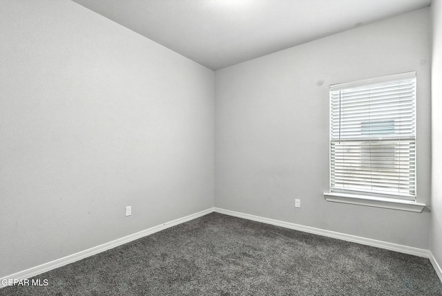 625 Paseo Dulce Ave, El Paso, TX 79928 - empty room featuring dark colored carpet and vaulted ceiling