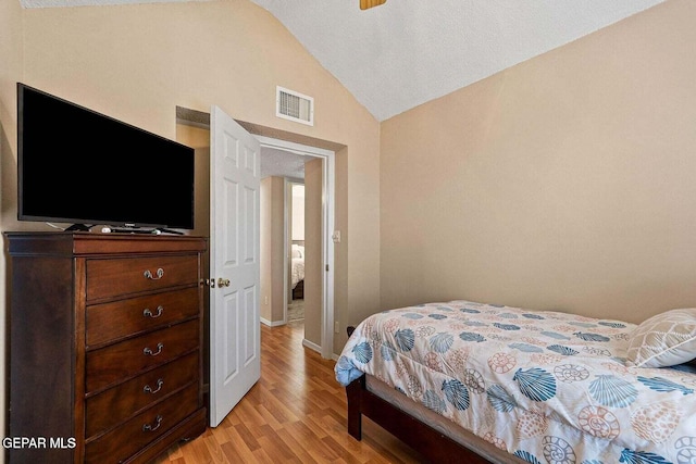 12232 Tierra Rosa Way, El Paso, TX 79938 - bedroom featuring lofted ceiling and light wood finished floors