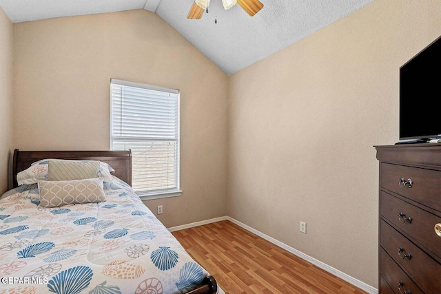 12232 Tierra Rosa Way, El Paso, TX 79938 - bedroom with vaulted ceiling, light wood finished floors, and ceiling fan
