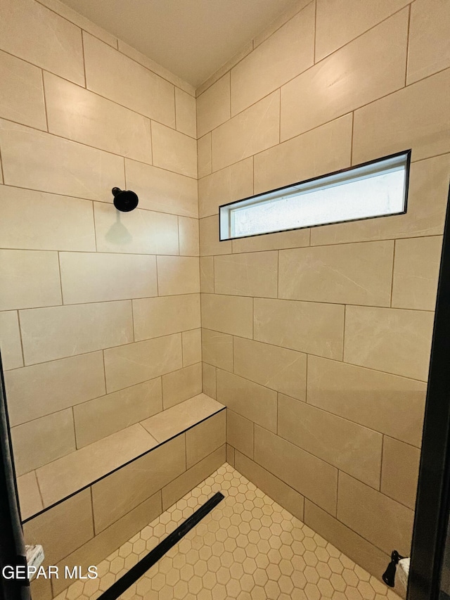 812 Acton St, El Paso, TX 79928 - full bathroom featuring tiled shower and healthy amount of natural light