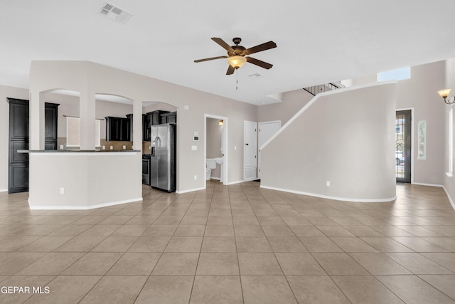 10925 Ray Mena Ln, El Paso, TX 79934 - unfurnished living room with a ceiling fan and light tile patterned floors