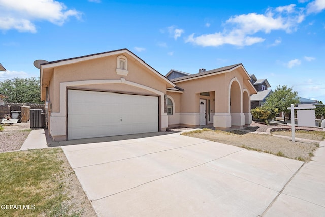 13788 Paseo Verde Dr, El Paso, TX 79928 - view of front facade featuring stucco siding, a garage, and driveway
