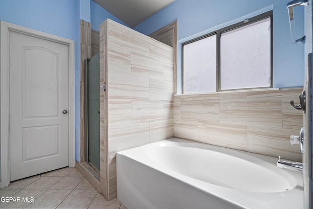 13788 Paseo Verde Dr, El Paso, TX 79928 - full bath with a bath, a stall shower, tile patterned floors, and tile walls