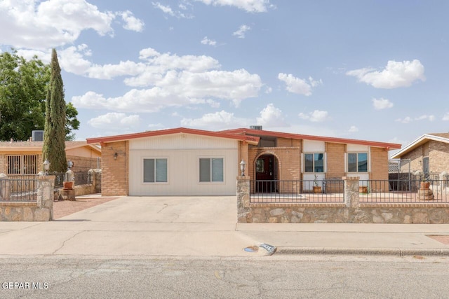 10636 Palomino St, El Paso, TX 79924 - ranch-style home featuring concrete driveway and a fenced front yard