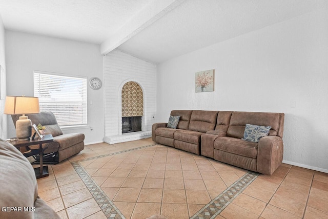 10636 Palomino St, El Paso, TX 79924 - living room featuring a brick fireplace, light tile patterned flooring, and inlaid floor details