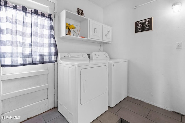 10636 Palomino St, El Paso, TX 79924 - laundry area featuring separate washer and dryer and cabinet space