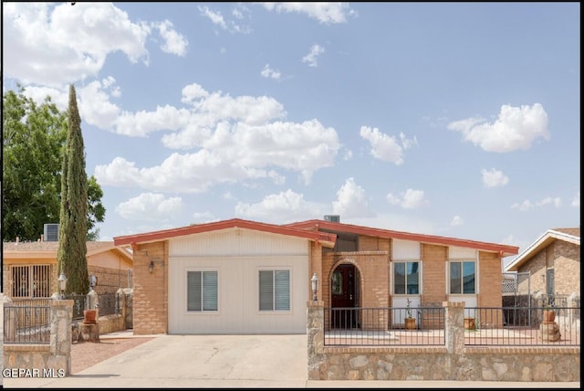 10636 Palomino St, El Paso, TX 79924 - ranch-style house with concrete driveway and brick siding