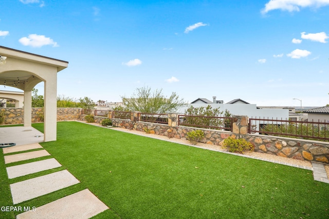 7426 Sidewinder Bend Dr, El Paso, TX 79911 - fenced backyard featuring a patio