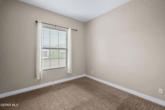7426 Sidewinder Bend Dr, El Paso, TX 79911 - carpeted empty room with baseboards