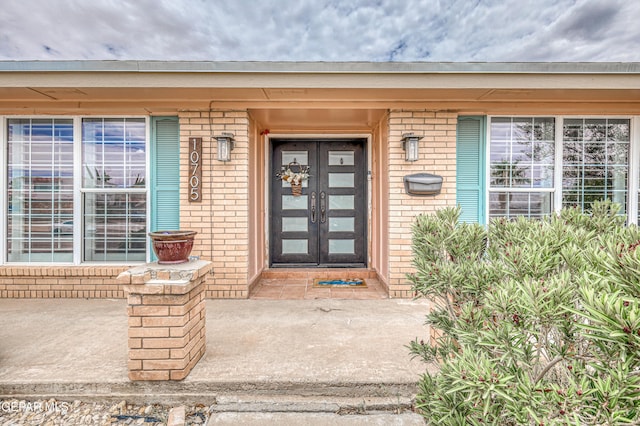 10705 Vista Alegre Dr, El Paso, TX 79935 - entrance to property featuring brick siding and french doors