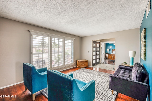 10705 Vista Alegre Dr, El Paso, TX 79935 - living room with wood finished floors, a textured ceiling, and french doors
