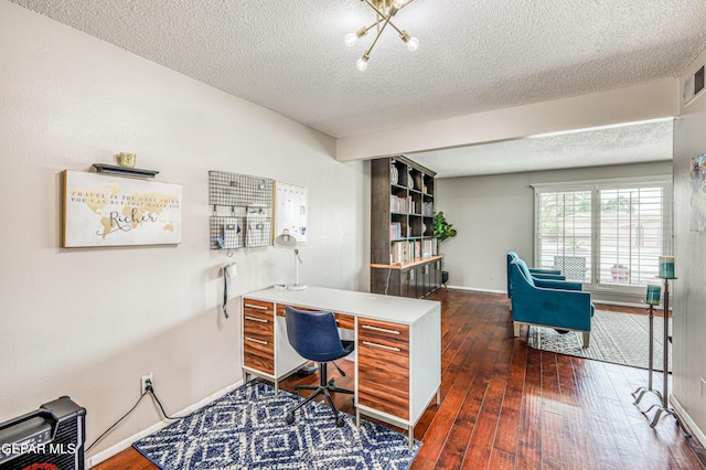 10705 Vista Alegre Dr, El Paso, TX 79935 - home office with a textured ceiling and dark wood-style flooring