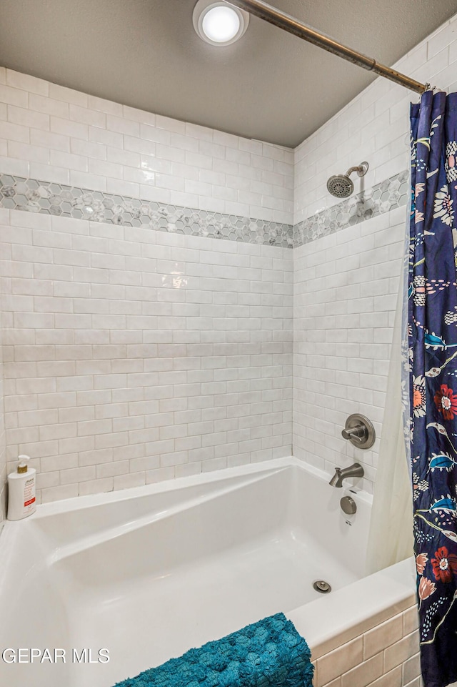 10705 Vista Alegre Dr, El Paso, TX 79935 - bathroom with shower / bath combination with curtain
