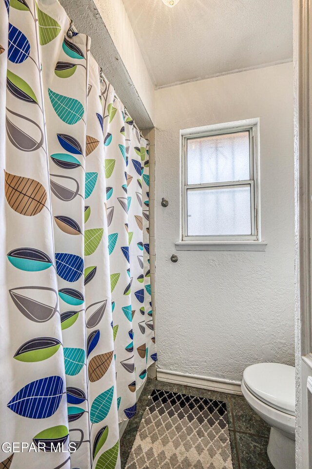 10705 Vista Alegre Dr, El Paso, TX 79935 - full bathroom featuring a shower with curtain and tile patterned flooring