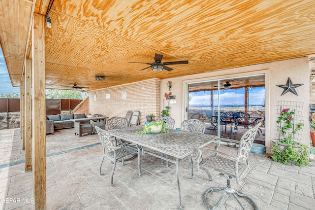 10705 Vista Alegre Dr, El Paso, TX 79935 - view of patio / terrace with a ceiling fan, outdoor dining space, and an outdoor living space