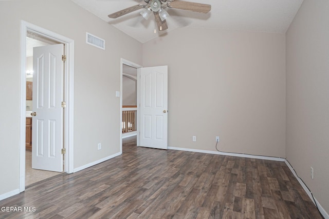3340 Tierra Yvette Ln, El Paso, TX 79938 - unfurnished bedroom featuring wood finished floors, lofted ceiling, and a ceiling fan